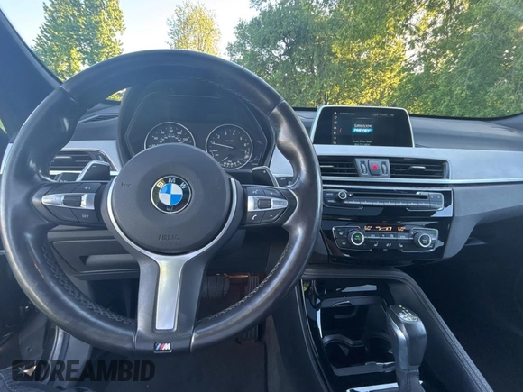 2018 BMW X1 xDrive28i with VIN WBXHT3C33J5K24081, listed as a Copart auction lot 55887425 with 178,946 mi miles and Clean Title. Bid and sale history available at carsss.com. Image 9.