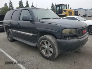 2004 GMC Yukon SLT with VIN 1GKEC13T74R201960, listed as a Copart auction lot 76591114 with 158,498 mi miles and Salvage Title. Bid and sale history available at carsss.com. Image 4.