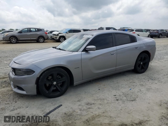 2016 Dodge Charger R/T with VIN 2C3CDXCTXGH222331, listed as a Copart auction lot 59428915 with 120,691 mi miles and Salvage title. Bid and sale history available at DreamBid. Image 1.