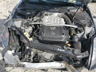2005 Nissan 350Z with VIN JN1AZ34D05M606703, listed as a Copart auction lot 69631414 with 133,519 mi miles and Salvage Title. Bid and sale history available at carsss.com. Image 13.