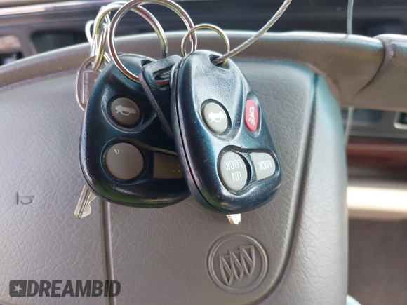 1999 Buick LeSabre Custom with VIN 1G4HP52K7XH414605, listed as a IAAI auction lot 42109396 with 156,267 mi miles and . Bid and sale history available at DreamBid. Image 11.