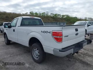 2013 Ford F-150 XL with VIN 1FTMF1EM1DKF11213, listed as a IAAI auction lot 40984100 with 117,793 mi miles and . Bid and sale history available at carsss.com. Image 3.