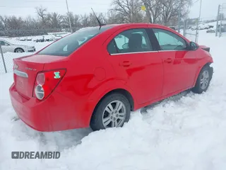 2014 Chevrolet Sonic LT with VIN 1G1JC5SH3E4148938, listed as a IAAI auction lot 41614802 with 135,847 mi miles and . Bid and sale history available at DreamBid. Image 4.