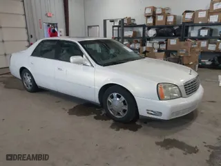2004 Cadillac DeVille with VIN 1G6KD54Y94U209085, listed as a IAAI auction lot 41579806 with 125,344 mi miles. Bid and sale history available at carsss.com. Image 1.