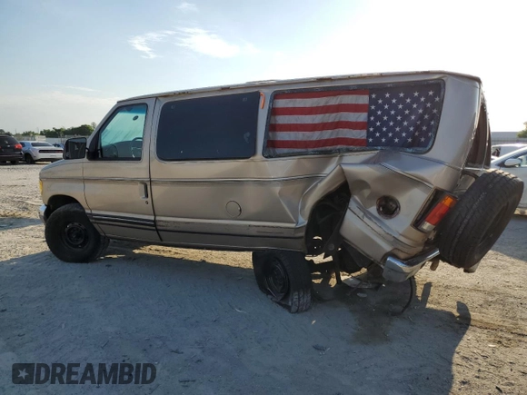 1994 Ford Econoline Cargo with VIN 1FTEE14N0RHB57870, listed as a Copart auction lot 52521055 with Not Provided miles and Salvage Title. Bid and sale history available at DreamBid. Image 2.