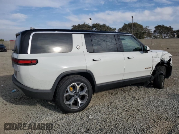 2024 Rivian R1S Adventure z VIN 7PDSGABA4RN043975, wystawiony jako Copart lot #41524615 z przebiegiem 6 807 mil mil oraz Szkoda całkowita • Salvage title. Historia ofert i sprzedaży dostępna na DreamBid. Obrazek 3.