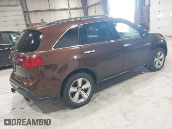 2011 Acura MDX Tech Pkg with VIN 2HNYD2H66BH541588, listed as a IAAI auction lot 42002712 with 216,298 mi miles. Bid and sale history available at carsss.com. Image 4.