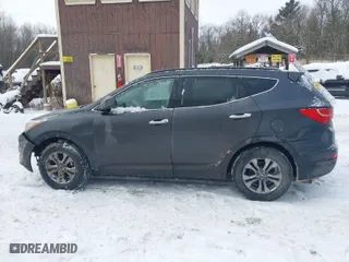 2016 Hyundai Santa Fe Sport with VIN 5XYZUDLBXGG357335, listed as a IAAI auction lot 41283068 with 116,723 mi miles. Bid and sale history available at carsss.com. Image 14.