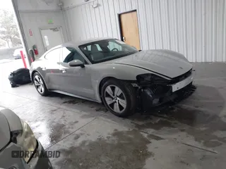 2024 Porsche Taycan with VIN WP0AA2Y14RSA12859, listed as a IAAI auction lot 41555149 with 9,217 mi miles and . Bid and sale history available at DreamBid. Image 1.