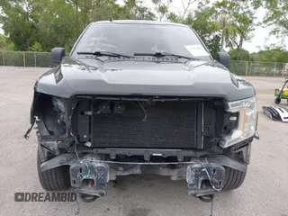 2019 Ford F-150 XL with VIN 1FTFW1E56KFB72035, listed as a IAAI auction lot 41974489 with 116,136 mi miles. Bid and sale history available at carsss.com. Image 13.