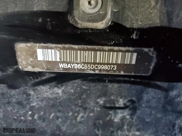 2013 BMW 7 Series 750i xDrive with VIN WBAYB6C55DC998073, listed as a Copart auction lot 67552004 with 0 mi miles and Salvage Title. Bid and sale history available at carsss.com. Image 12.