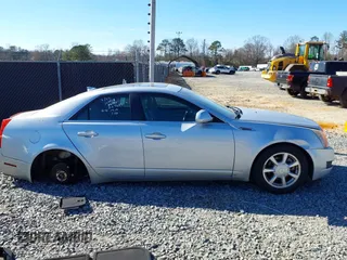 2009 Cadillac CTS AWD z VIN 1G6DS57V090127289, wystawiony jako IAAI lot #41675952 z przebiegiem 147 464 mil mil oraz . Historia ofert i sprzedaży dostępna na DreamBid. Obrazek 13.