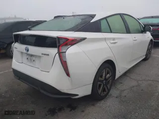 2017 Toyota Prius Two with VIN JTDKARFUXH3037751, listed as a IAAI auction lot 41471974 with 140,787 mi miles. Bid and sale history available at carsss.com. Image 4.