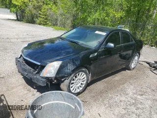 2009 Cadillac CTS AWD z VIN 1G6DG577590128876, wystawiony jako Copart lot #58034645 z przebiegiem 242 831 mil mil oraz Czysty tytuł • Clean title. Historia ofert i sprzedaży dostępna na DreamBid. Obrazek 1.