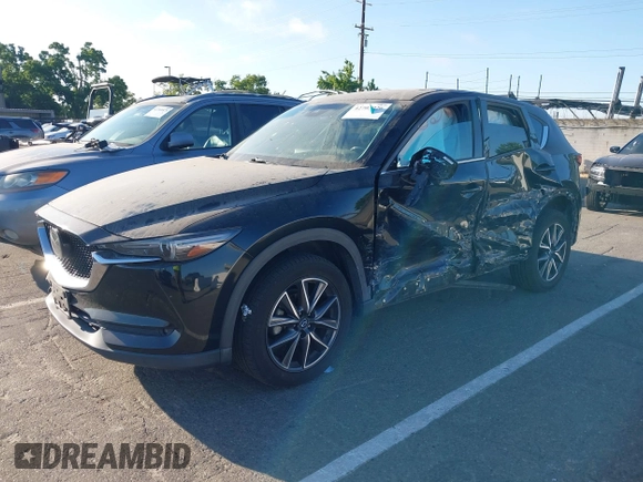 2018 Mazda CX-5 Grand Touring with VIN JM3KFBDM1J0345014, listed as a IAAI auction lot 42703926 with 151,453 mi miles and . Bid and sale history available at DreamBid. Image 17.