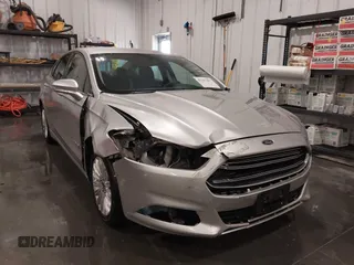 2014 Ford Fusion SE Hybrid с VIN 3FA6P0LU1ER227571, выставлен на аукционе IAAI как лот 42391487 с пробегом 127 979 миль миль и . История ставок и продаж доступна на DreamBid. Изображение 6.