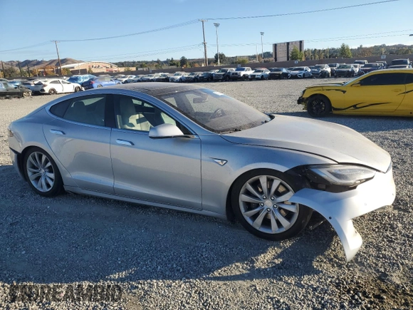 2016 Tesla Model S 90D with VIN 5YJSA1E26GF147974, listed as a Copart auction lot 82815404 with 126,609 mi miles and Salvage Title. Bid and sale history available at DreamBid. Image 4.