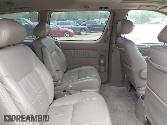 2002 Toyota Sienna LE with VIN 4T3ZF13C12U437425, listed as a IAAI auction lot 41157987 with 200,309 mi miles. Bid and sale history available at carsss.com. Image 8.