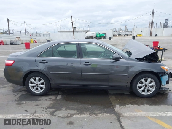 2007 Toyota Camry LE with VIN JTNBK46K873015787, listed as a IAAI auction lot 42071849 with 61,661 mi miles and . Bid and sale history available at DreamBid. Image 13.