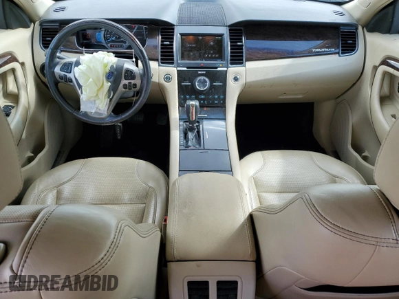 2013 Ford Taurus Limited with VIN 1FAHP2F86DG100713, listed as a Copart auction lot 52599085 with 168,771 mi miles and Salvage title. Bid and sale history available at DreamBid. Image 8.