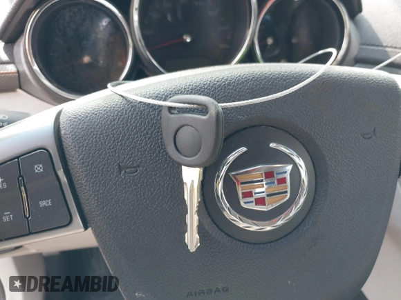 2012 Cadillac CTS with VIN 1G6DA5E58C0152938, listed as a IAAI auction lot 42319555 with 190,259 mi miles and . Bid and sale history available at DreamBid. Image 11.