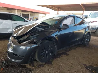 2024 Tesla Model Y with VIN 7SAYGDED9RF053203, listed as a IAAI auction lot 41906729 with Not Provided miles and . Bid and sale history available at DreamBid. Image 17.