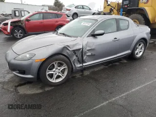 2005 Mazda RX-8 with VIN JM1FE17N050156100, listed as a Copart auction lot 84370154 with 76,054 mi miles and Salvage Title. Bid and sale history available at carsss.com. Image 1.