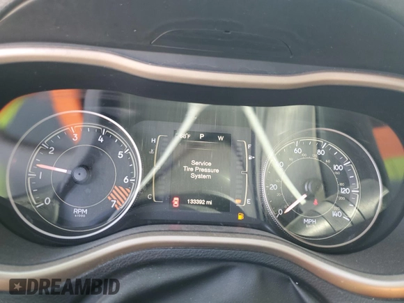 2014 Jeep Cherokee Altitude with VIN 1C4PJMCB0EW230724, listed as a Copart auction lot 49576945 with 133,392 mi miles and Salvage Title. Bid and sale history available at carsss.com. Image 9.
