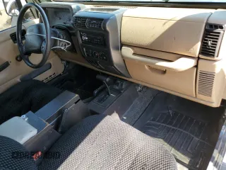 2002 Jeep Wrangler Sport с VIN 1J4FA49SX2P738105, выставлен на аукционе Copart как лот 60320775 с пробегом 402 518 миль миль и Списание • Salvage title. История ставок и продаж доступна на DreamBid. Изображение 8.