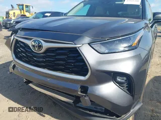 2023 Toyota Highlander L z VIN 5TDKDRAH6PS039527, wystawiony jako IAAI lot #42165200 z przebiegiem 27 350 mil mil oraz . Historia ofert i sprzedaży dostępna na DreamBid. Obrazek 17.