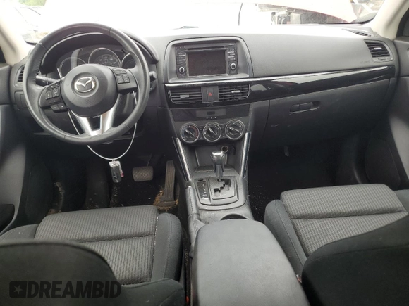2014 Mazda CX-5 Touring z VIN JM3KE4CY3E0382106, wystawiony jako Copart lot #55521645 z przebiegiem 84 539 mil mil oraz Szkoda całkowita • Salvage title. Historia ofert i sprzedaży dostępna na DreamBid. Obrazek 8.