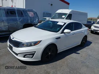 2015 Kia Optima LX z VIN KNAGM4A7XF5528918, wystawiony jako IAAI lot #42673801 z przebiegiem 132 968 mil mil oraz . Historia ofert i sprzedaży dostępna na DreamBid. Obrazek 2.