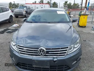 2013 Volkswagen CC Sport with VIN WVWBP7AN3DE571837, listed as a IAAI auction lot 41784447 with 156,834 mi miles. Bid and sale history available at carsss.com. Image 12.