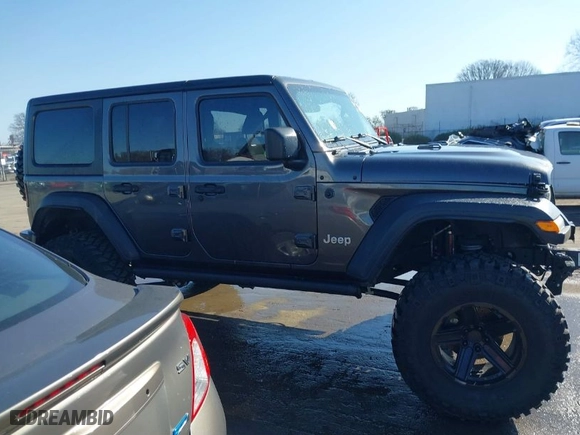 2019 Jeep Wrangler Unlimited Sport S with VIN 1C4HJXDG2KW612913, listed as a IAAI auction lot 41519311 with 104,583 mi miles. Bid and sale history available at carsss.com. Image 14.