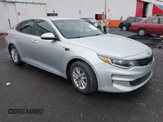 2017 Kia Optima LX with VIN KNAGT4L3XH5162197, listed as a IAAI auction lot 41754002 with 77,141 mi miles. Bid and sale history available at carsss.com. Image 1.