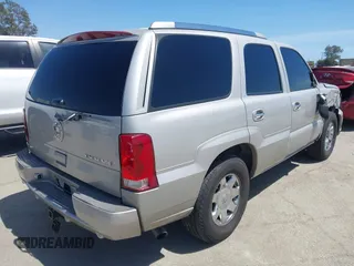 2005 Cadillac Escalade z VIN 1GYEC63N65R249827, wystawiony jako IAAI lot #42247650 z przebiegiem 254 052 mil mil oraz . Historia ofert i sprzedaży dostępna na DreamBid. Obrazek 4.