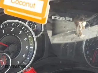 2019 Ram 1500 Big Horn z VIN 1C6RREFT4KN769061, wystawiony jako IAAI lot #41356744 z przebiegiem Nie podano mil oraz . Historia ofert i sprzedaży dostępna na DreamBid. Obrazek 15.