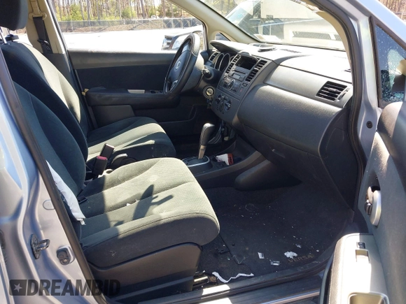 2010 Nissan Versa 1.8 SL with VIN 3N1BC1CP8AL448282, listed as a IAAI auction lot 42028658 with 101,131 mi miles. Bid and sale history available at carsss.com. Image 5.