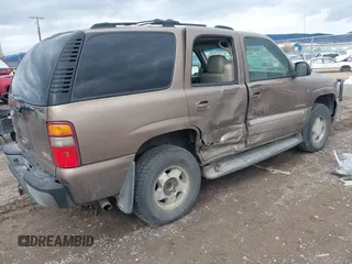 2003 GMC Yukon SLT z VIN 1GKEK13Z93R211332, wystawiony jako IAAI lot #41739150 z przebiegiem Nie podano mil oraz . Historia ofert i sprzedaży dostępna na DreamBid. Obrazek 4.