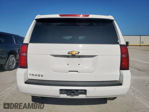 2015 Chevrolet Tahoe LT with VIN 1GNSCBKC5FR185631, listed as a Copart auction lot 60427395 with 125,616 mi miles and Clean title. Bid and sale history available at DreamBid. Image 6.