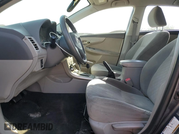 2009 Toyota Corolla with VIN JTDBL40E599082108, listed as a Copart auction lot 52726275 with 194,502 mi miles and Salvage Title. Bid and sale history available at carsss.com. Image 7.