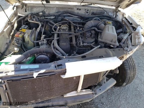 1999 Jeep Cherokee Sport with VIN 1J4FT68S9XL627003, listed as a Copart auction lot 49478595 with 320,444 mi miles and Salvage Title. Bid and sale history available at carsss.com. Image 12.