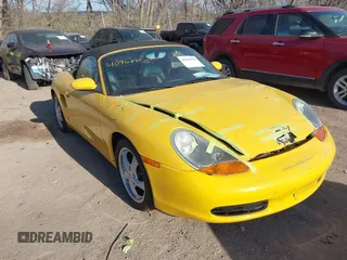 2000 Porsche Boxster z VIN WP0CA2985YU620510, wystawiony jako IAAI lot #40968950 z przebiegiem 55 000 mil mil oraz . Historia ofert i sprzedaży dostępna na DreamBid. Obrazek 1.