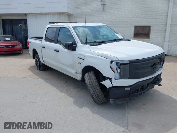 2023 Ford F-150 Lightning Pro with VIN 1FTVW1EL2PWG18764, listed as a IAAI auction lot 41908278 with 16,276 mi miles and . Bid and sale history available at DreamBid. Image 1.