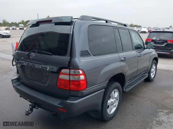 2004 Toyota Land Cruiser with VIN JTEHT05JX42059414, listed as a IAAI auction lot 41919791 with 210,528 mi miles. Bid and sale history available at carsss.com. Image 4.