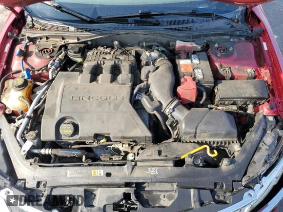 2012 Lincoln MKZ z VIN 3LNHL2GC7CR818220, wystawiony jako Copart lot #63058095 z przebiegiem 192 896 mil mil oraz Szkoda całkowita • Salvage title. Historia ofert i sprzedaży dostępna na DreamBid. Obrazek 11.