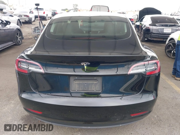 2023 Tesla Model 3 with VIN 5YJ3E1EA7PF473749, listed as a IAAI auction lot 41921478 with 21,483 mi miles and . Bid and sale history available at DreamBid. Image 15.