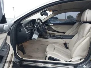 2013 BMW 6 Series 650i with VIN WBAYM9C53DDW20145, listed as a IAAI auction lot 42039618 with 66,684 mi miles and . Bid and sale history available at carsss.com. Image 5.