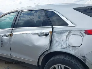 2019 Cadillac XT5 Premium Luxury AWD z VIN 1GYKNFRS0KZ207739, wystawiony jako IAAI lot #42229089 z przebiegiem 99 801 mil mil oraz . Historia ofert i sprzedaży dostępna na DreamBid. Obrazek 6.