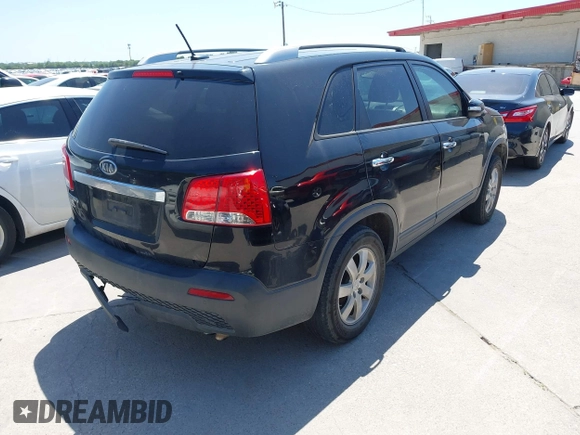 2013 Kia Sorento LX with VIN 5XYKT3A64DG363163, listed as a IAAI auction lot 42811435 with 199,427 mi miles and . Bid and sale history available at DreamBid. Image 4.